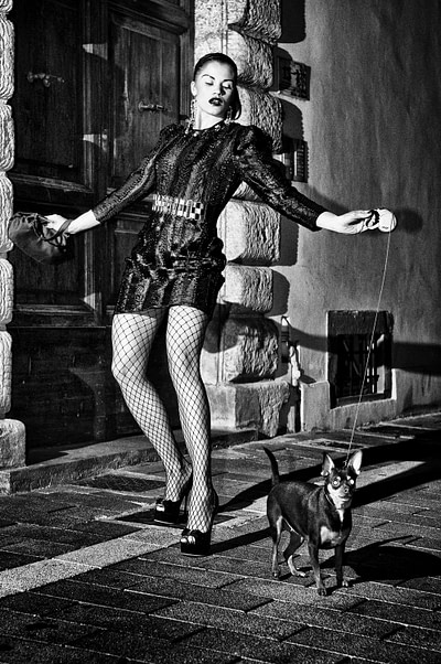 Woman walking dog, Orbetello, 2012